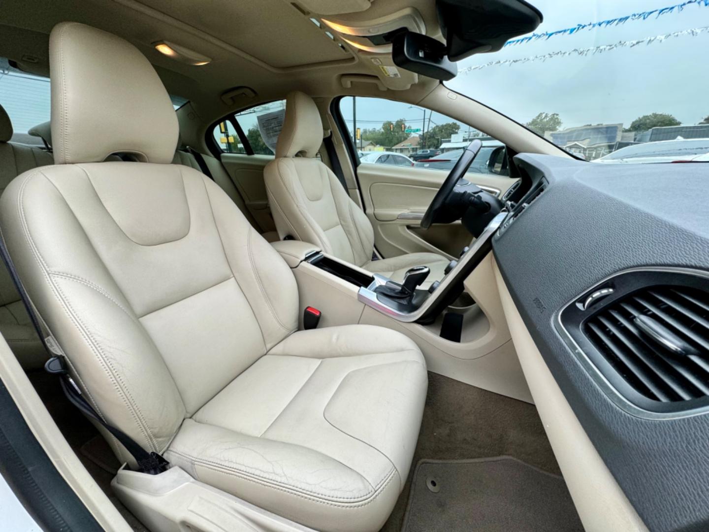 2015 WHITE VOLVO S60 PREMIER PLUS (YV140MFC3F1) , located at 5900 E. Lancaster Ave., Fort Worth, TX, 76112, (817) 457-5456, 0.000000, 0.000000 - This is a 2015 VOLVO S60 PREMIER PLUS 4 DOOR SEDAN that is in excellent condition. There are no dents or scratches. The interior is clean with no rips or tears or stains. All power windows, door locks and seats. Ice cold AC for those hot Texas summer days. It is equipped with a CD player, AM/FM radi - Photo#16